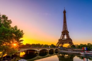 View of Eiffel Tower and river Seine at sunrise in Paris, France